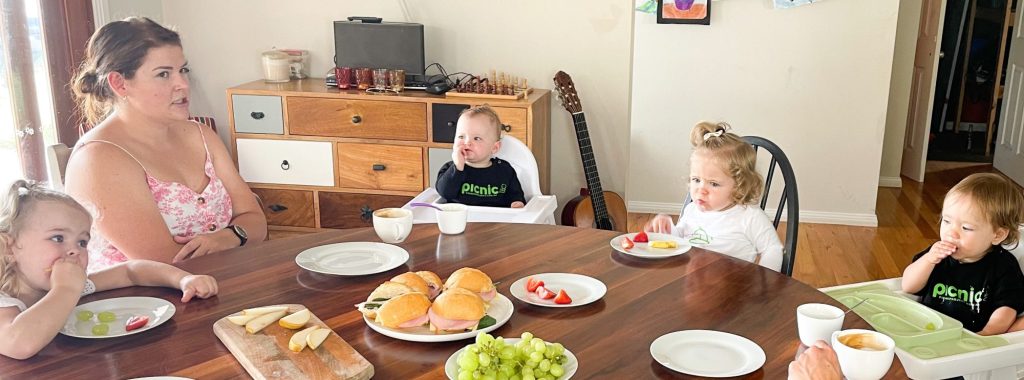 Image of all eating together at table 