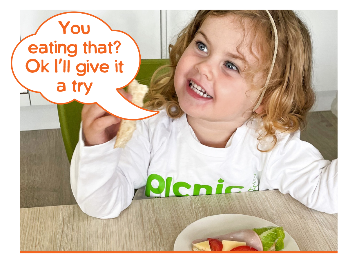 Child sayiong, "You eating that? Ok I'll give it a try"